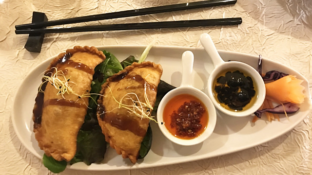 The Momo served with a spicy black bean and chilli oil.